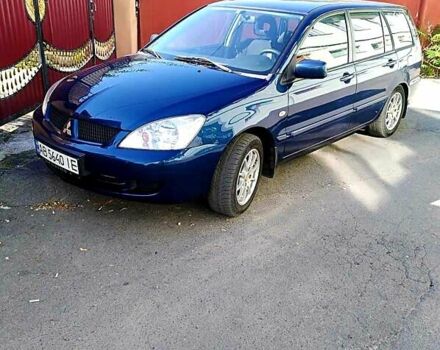 Мицубиси Лансер 2006 в Могилев-Подольском на Automoto.ua Синий Мицубиси Лансер, объемом двигателя 1.6 л и пробегом 221 тыс. км за 4700 $, фото 35 на Automoto.ua