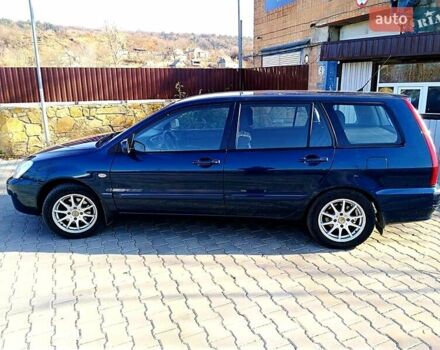 Мицубиси Лансер 2006 в Могилев-Подольском на Automoto.ua Синий Мицубиси Лансер, объемом двигателя 1.6 л и пробегом 221 тыс. км за 4700 $, фото 22 на Automoto.ua