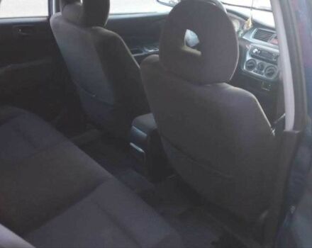 Синій Міцубісі Lancer, об'ємом двигуна 1.6 л та пробігом 245 тис. км за 3299 $, фото 9 на Automoto.ua