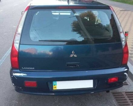 Синій Міцубісі Lancer, об'ємом двигуна 1.6 л та пробігом 245 тис. км за 3299 $, фото 12 на Automoto.ua