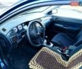 Мицубиси Лансер 2006 в Могилев-Подольском на Automoto.ua Синий Мицубиси Лансер, объемом двигателя 1.6 л и пробегом 221 тыс. км за 4700 $, фото 25 на Automoto.ua