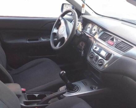 Синій Міцубісі Lancer, об'ємом двигуна 1.6 л та пробігом 245 тис. км за 3299 $, фото 7 на Automoto.ua