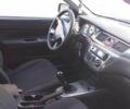 Синій Міцубісі Lancer, об'ємом двигуна 1.6 л та пробігом 245 тис. км за 3299 $, фото 7 на Automoto.ua