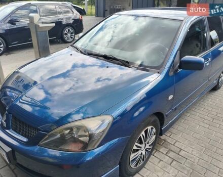 Синій Міцубісі Lancer, об'ємом двигуна 1.6 л та пробігом 258 тис. км за 3000 $, фото 1 на Automoto.ua