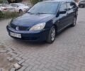 Синий Мицубиси Лансер, объемом двигателя 1.58 л и пробегом 290 тыс. км за 3950 $, фото 1 на Automoto.ua