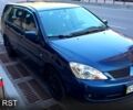 Синій Міцубісі Lancer, об'ємом двигуна 1.6 л та пробігом 245 тис. км за 3299 $, фото 1 на Automoto.ua