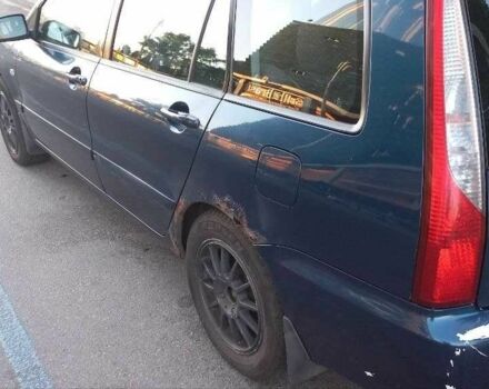 Синій Міцубісі Lancer, об'ємом двигуна 1.6 л та пробігом 245 тис. км за 3299 $, фото 13 на Automoto.ua