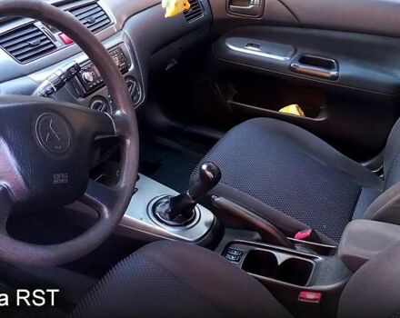 Синій Міцубісі Lancer, об'ємом двигуна 1.6 л та пробігом 245 тис. км за 3299 $, фото 4 на Automoto.ua