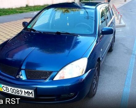 Синій Міцубісі Lancer, об'ємом двигуна 1.6 л та пробігом 245 тис. км за 3299 $, фото 6 на Automoto.ua