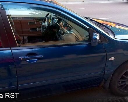 Синій Міцубісі Lancer, об'ємом двигуна 1.6 л та пробігом 245 тис. км за 3299 $, фото 1 на Automoto.ua