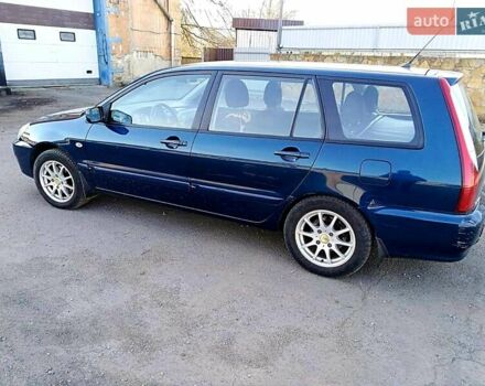 Мицубиси Лансер 2006 в Могилев-Подольском на Automoto.ua Синий Мицубиси Лансер, объемом двигателя 1.6 л и пробегом 221 тыс. км за 4700 $, фото 34 на Automoto.ua