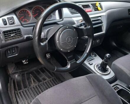 Міцубісі Lancer 2006 у Дніпро (Дніпропетровську) на Automoto.ua Синій Міцубісі Lancer, об'ємом двигуна 1.58 л та пробігом 290 тис. км за 3600 $, фото 9 на Automoto.ua