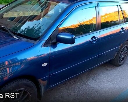 Синій Міцубісі Lancer, об'ємом двигуна 1.6 л та пробігом 245 тис. км за 3299 $, фото 7 на Automoto.ua