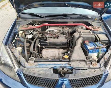 Мицубиси Лансер 2006 в Ковель на Automoto.ua Синий Мицубиси Лансер, объемом двигателя 1.6 л и пробегом 258 тыс. км за 3900 $, фото 19 на Automoto.ua