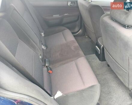 Синій Міцубісі Lancer, об'ємом двигуна 1.6 л та пробігом 258 тис. км за 3000 $, фото 10 на Automoto.ua