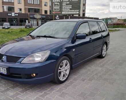 Синій Міцубісі Lancer, об'ємом двигуна 2 л та пробігом 211 тис. км за 3950 $, фото 1 на Automoto.ua