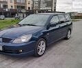 Синій Міцубісі Lancer, об'ємом двигуна 2 л та пробігом 211 тис. км за 3950 $, фото 1 на Automoto.ua