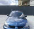 Синій Міцубісі Lancer, об'ємом двигуна 2 л та пробігом 330 тис. км за 4200 $, фото 1 на Automoto.ua