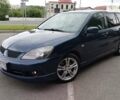 Синій Міцубісі Lancer, об'ємом двигуна 2 л та пробігом 211 тис. км за 3950 $, фото 1 на Automoto.ua