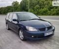 Синій Міцубісі Lancer, об'ємом двигуна 2 л та пробігом 211 тис. км за 3950 $, фото 3 на Automoto.ua