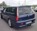 Синій Міцубісі Lancer, об'ємом двигуна 2 л та пробігом 211 тис. км за 3950 $, фото 15 на Automoto.ua