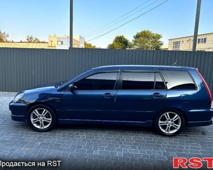 Синий Мицубиси Лансер, объемом двигателя 2 л и пробегом 330 тыс. км за 3400 $, фото 3 на Automoto.ua