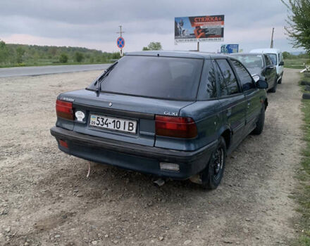 Синій Міцубісі Lancer, об'ємом двигуна 1.5 л та пробігом 352 тис. км за 1100 $, фото 4 на Automoto.ua