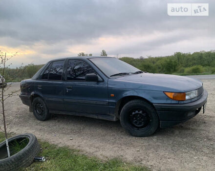 Синій Міцубісі Lancer, об'ємом двигуна 1.5 л та пробігом 352 тис. км за 1100 $, фото 1 на Automoto.ua