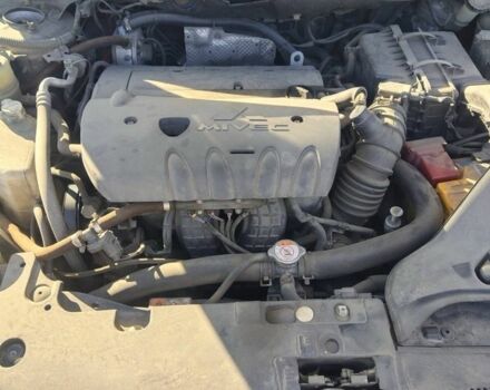 Синий Мицубиси Лансер, объемом двигателя 2.4 л и пробегом 185 тыс. км за 7300 $, фото 7 на Automoto.ua