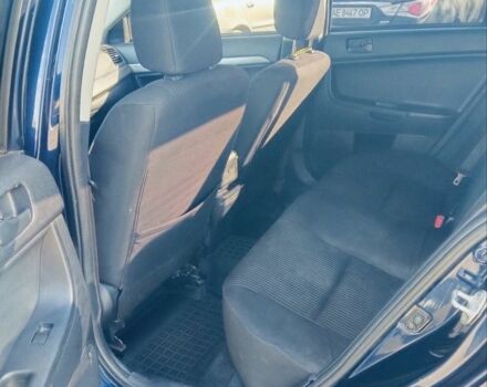 Синий Мицубиси Лансер, объемом двигателя 2.4 л и пробегом 185 тыс. км за 7300 $, фото 3 на Automoto.ua