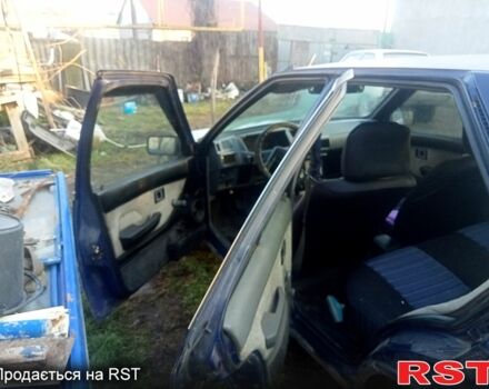 Синий Мицубиси Лансер, объемом двигателя 1.6 л и пробегом 300 тыс. км за 800 $, фото 1 на Automoto.ua