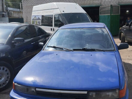 Синий Мицубиси Лансер, объемом двигателя 1.5 л и пробегом 300 тыс. км за 1300 $, фото 1 на Automoto.ua