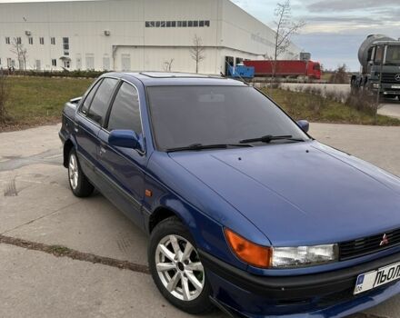 Синий Мицубиси Лансер, объемом двигателя 1.8 л и пробегом 245 тыс. км за 3200 $, фото 1 на Automoto.ua