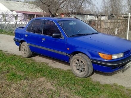 Синій Міцубісі Lancer, об'ємом двигуна 1.5 л та пробігом 250 тис. км за 850 $, фото 1 на Automoto.ua