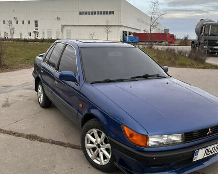 Синій Міцубісі Lancer, об'ємом двигуна 1.8 л та пробігом 245 тис. км за 3000 $, фото 1 на Automoto.ua