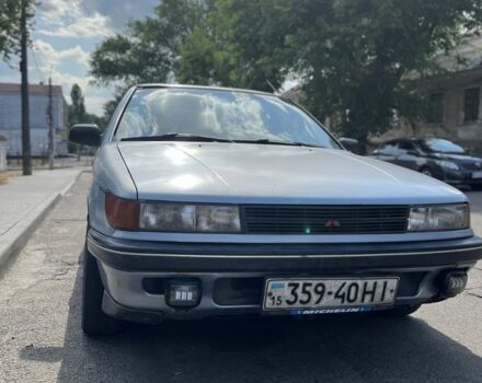 Синій Міцубісі Lancer, об'ємом двигуна 1.6 л та пробігом 417 тис. км за 1000 $, фото 1 на Automoto.ua