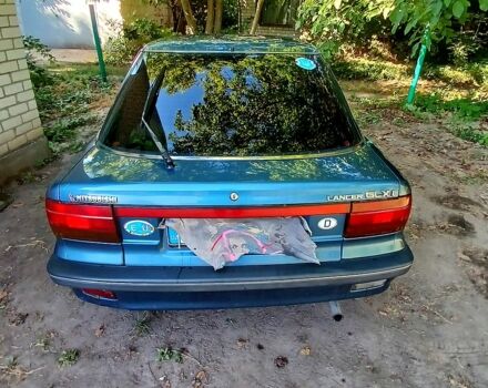 Синий Мицубиси Лансер, объемом двигателя 1.5 л и пробегом 280 тыс. км за 1730 $, фото 1 на Automoto.ua