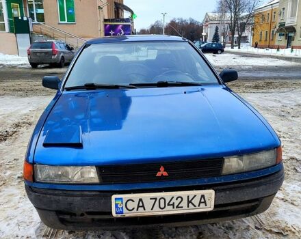 Синий Мицубиси Лансер, объемом двигателя 1.5 л и пробегом 300 тыс. км за 1200 $, фото 1 на Automoto.ua