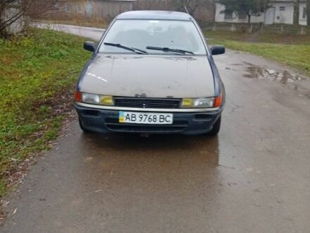 Синий Мицубиси Лансер, объемом двигателя 1.6 л и пробегом 3 тыс. км за 500 $, фото 1 на Automoto.ua