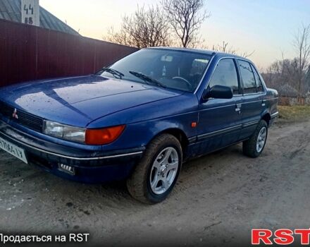 Синий Мицубиси Лансер, объемом двигателя 1.5 л и пробегом 0 тыс. км за 1700 $, фото 1 на Automoto.ua