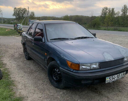 Синій Міцубісі Lancer, об'ємом двигуна 1.5 л та пробігом 352 тис. км за 1100 $, фото 1 на Automoto.ua