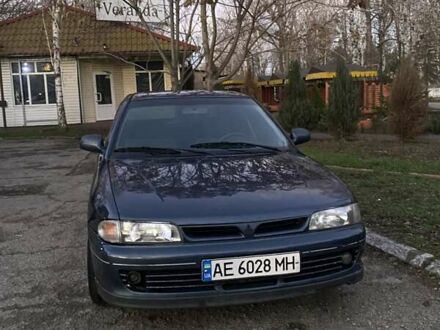 Синий Мицубиси Лансер, объемом двигателя 1.6 л и пробегом 100 тыс. км за 2500 $, фото 1 на Automoto.ua