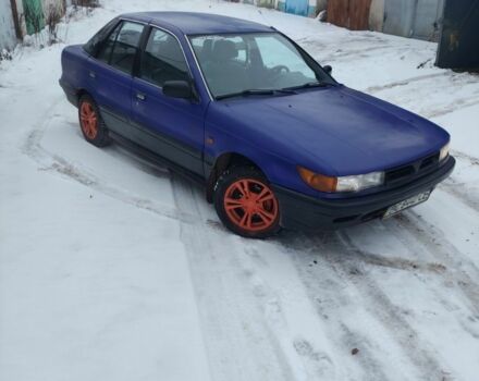 Синій Міцубісі Lancer, об'ємом двигуна 1 л та пробігом 291 тис. км за 1173 $, фото 1 на Automoto.ua