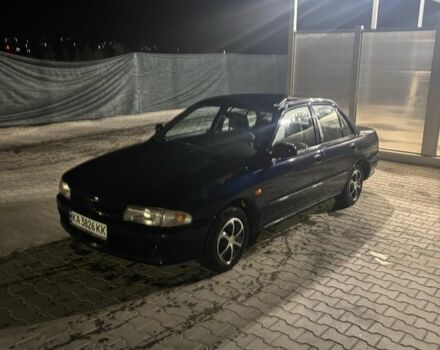 Синий Мицубиси Лансер, объемом двигателя 1.3 л и пробегом 300 тыс. км за 1700 $, фото 1 на Automoto.ua