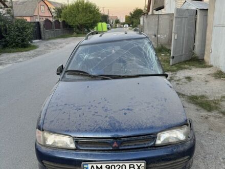 Синий Мицубиси Лансер, объемом двигателя 1.6 л и пробегом 999 тыс. км за 594 $, фото 1 на Automoto.ua