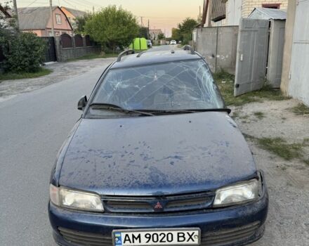 Синий Мицубиси Лансер, объемом двигателя 1.6 л и пробегом 999 тыс. км за 594 $, фото 1 на Automoto.ua