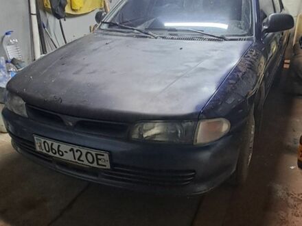 Синий Мицубиси Лансер, объемом двигателя 0 л и пробегом 140 тыс. км за 1500 $, фото 1 на Automoto.ua