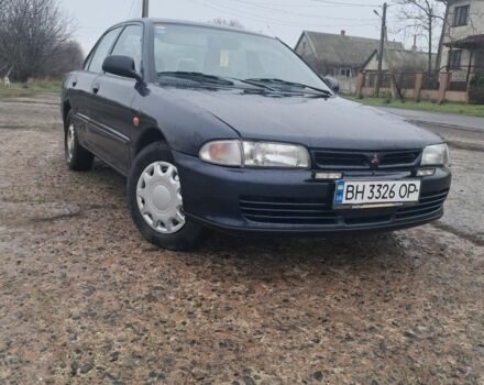 Синій Міцубісі Lancer, об'ємом двигуна 1.3 л та пробігом 370 тис. км за 1300 $, фото 1 на Automoto.ua
