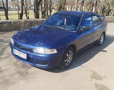 Синий Мицубиси Лансер, объемом двигателя 1.3 л и пробегом 2 тыс. км за 2204 $, фото 1 на Automoto.ua