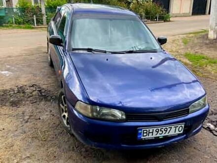 Мицубиси Лансер 1996 в Доброслав (Коминтерновское) на Automoto.ua Синий Мицубиси Лансер, объемом двигателя 1.3 л и пробегом 300 тыс. км за 2300 $, фото 1 на Automoto.ua